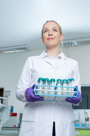 laboratory assistant analyzing a sampleの写真素材