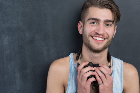 Portrait of young fashion man with headphones