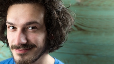 Portrait Of Young Handsome Man  against rustic  backgroundのeditorial素材