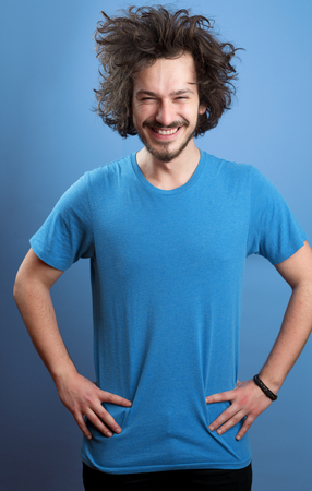 Beautiful afro man in front of a colored backgroundの写真素材