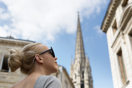 Beautiful woman exploring the city as a tourist in a Bordeaux in France.の写真素材
