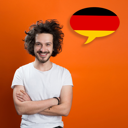 Man learn speaking german in bubbleの写真素材