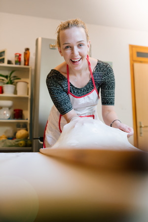 Homemade Bosnian  meat pie on the table in process of making,selective focus and blank spaceの写真素材
