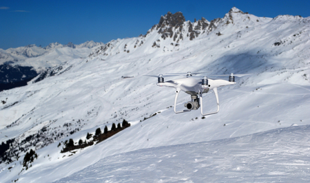 Flying drone in winter Alpine landscape panoramaの写真素材