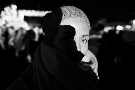 Girl at black background. Photo in black and white style.の写真素材