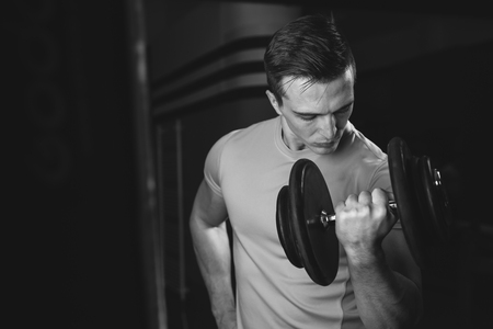 Portrait Of A Physically Fit Man In Modern Fitness Centerの写真素材