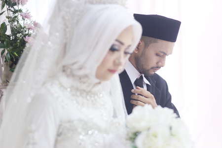 Romantic Muslim Couples at a celebration ceremonyの写真素材