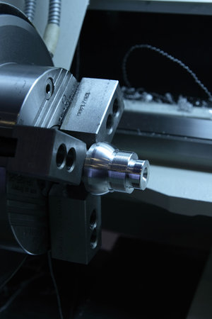 Workpiece in lathe jaw chuck.  