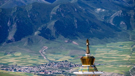 Tibetan pagoda against mountains and landscape of Qilian, Qinghai, China