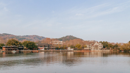 Traditional Chinese house by water in Hangzhou, Chinaの写真素材