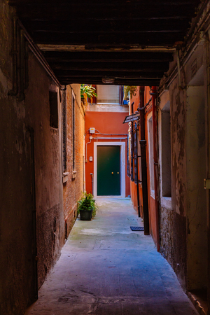 Alley and Venetian buildings in Venice, Italyのeditorial素材