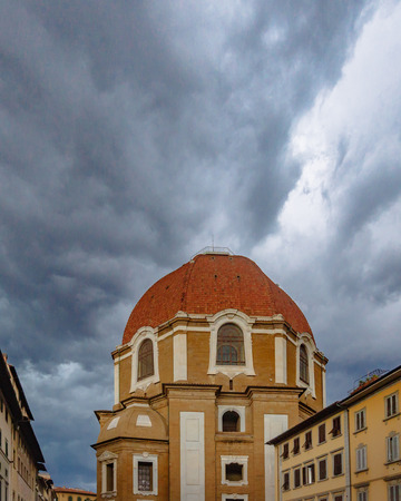 Dome of the San Lorenzo Basilica under clouds in the historic center of Florence, Italyのeditorial素材