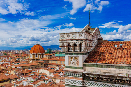 View of Florence Cathedral and dome of San Lorenzo Basilica from Giotto's bell tower, in Florence, Italyのeditorial素材