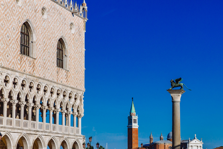 View of exterior of Doge's Palace, San Giorgio Maggiore church and bell tower, and Saint Mark column, in Venice, Italyのeditorial素材