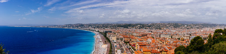 Panoramic view of the old town of Nice, France, next to Promenade des Anglais, by the blue sea, viewed from the Castle Hillのeditorial素材