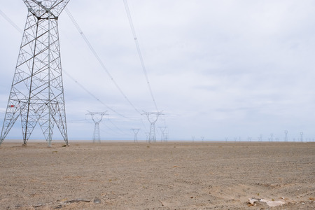 View of gobi desert with transmission towers near Dunhuang, Gansu, in northwestern Chinaのeditorial素材