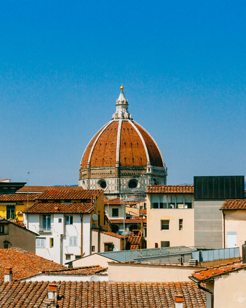 View of the dome of Florence Cathedral over buildings in the historical center of Florence, Italyの写真素材