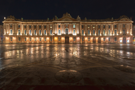 Front facade of Capitole de Toulouse, the city hall of the city of Toulouse, France, over Place du Capitole, at nightのeditorial素材