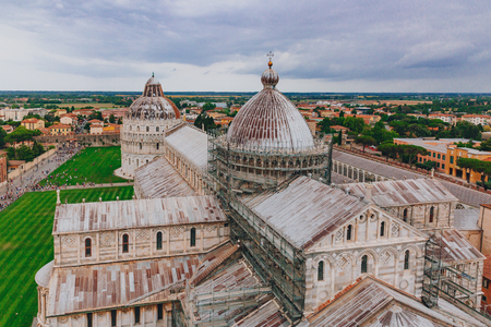 View of Cathedral Square with Pisa Cathedral and Baptistry from top of the Leaning Tower of Pisa, in Pisa, Italyのeditorial素材