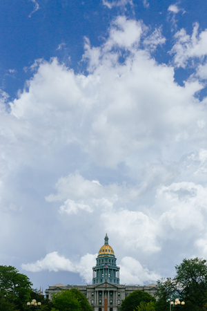 View of Colorado State Capitol under clouds and sky in downtown Denver, USAのeditorial素材