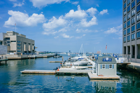 Boston, USA - May 28, 2016: View of Boston Harbor with boats and yachts at dock