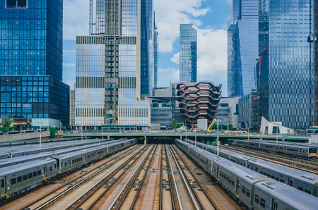 New York City, USA - June 24, 2018: View of trains and tracks in Hudson Yard and skyscrapers of Manhattanのeditorial素材