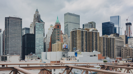 New York City, USA - Jan. 2, 2016: View of buildings of lower Manhattan from Brooklyn Bridgeのeditorial素材