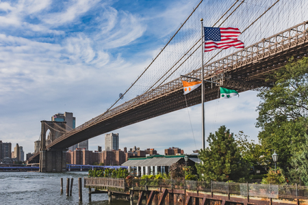 View of Brooklyn Bridge over East River with skyline of Manhattan, in New York, USAの写真素材