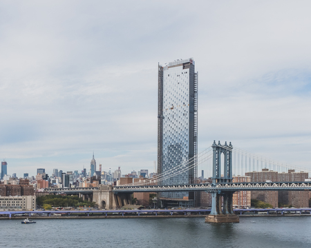 View of Manhattan Bridge over East River and buildings of Manhattan, in New York, USAのeditorial素材