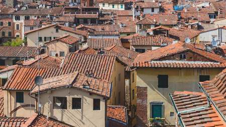 View of rooftops of houses in the historic centre of Lucca, Tuscany, Italyの写真素材