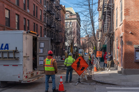 New York City, USA - Feb. 28, 2019: Road construction work in progress at intersection of Bedford and Barrow, in Greenwich Villageのeditorial素材