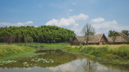 Houses by water at Archaeological Ruins of Liangzhu City, in Hangzhou, Chinaのeditorial素材
