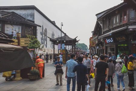 Hangzhou, China - May 11, 2019: People walking down streets in Hefang Street pedestrian mallのeditorial素材