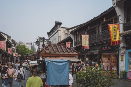 Hangzhou, China - May 11, 2019: People walking down streets in Hefang Street pedestrian mallのeditorial素材