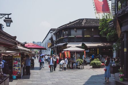 Hangzhou, China - May 11, 2019: People walking down streets in Hefang Street pedestrian mallのeditorial素材