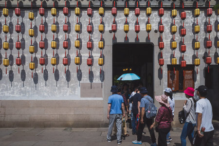 Nanxun, Zhejiang, China - 24 May 2019: Tourists entering Zhao's Mansion in Nanxun Old Town