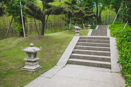 Footpath between trees in Lanting (Orchid Pavilion) scenic area in Shaoxing, China
