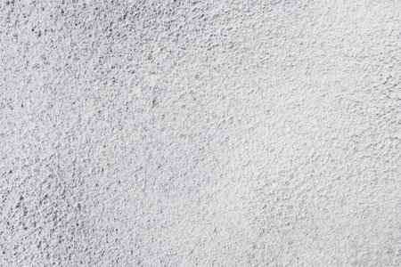 Background texture of white plaster wallの写真素材