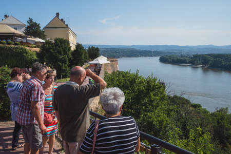July 27, 2019 - Novi Sad, Serbia: Tourists enjoying view of River Danube at Petrovaradin fortressのeditorial素材