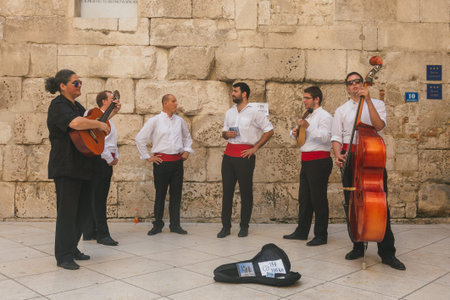 Split, Croatia - August 11, 2015: Street performers performing in Diocletian Palaceのeditorial素材