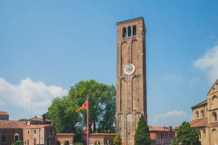 Tower of Basilica of Santi Maria e Donato on island of Murano, in Venic, Italyの写真素材