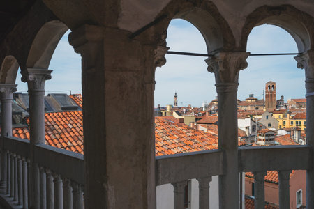 View of Venetian houses viewed between columns in Venice, Italyの写真素材
