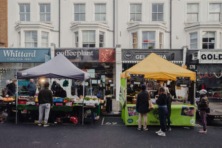 London, United Kingdom - January 1, 2021: People buying from street vendors at Portobello road market in Notting Hill, Londonのeditorial素材