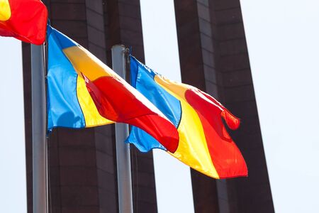 Romania national flags in front of the unknown soldier mausoleum from Bucharestの写真素材