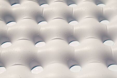 Pattern background of a wet white air matressの写真素材