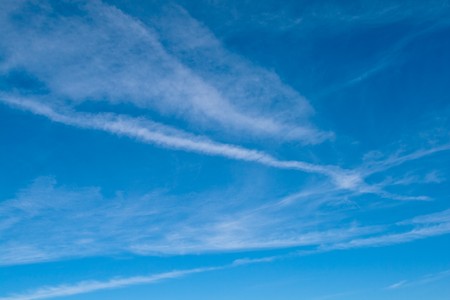 Stratos clouds sky background on a sunny dayの写真素材