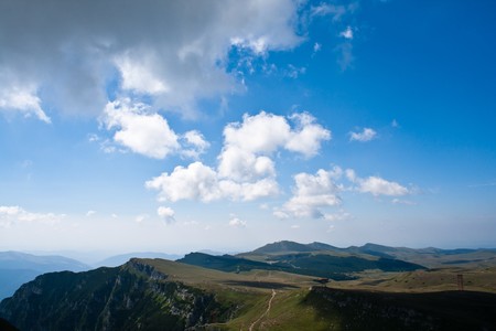 Fluffy clouds over the Carpathians, Bucegi Romaniaの写真素材