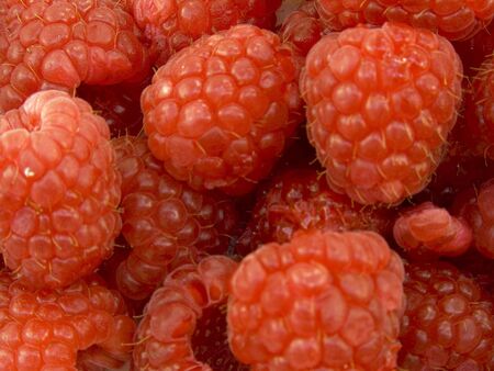 A close up shot of some raspberries