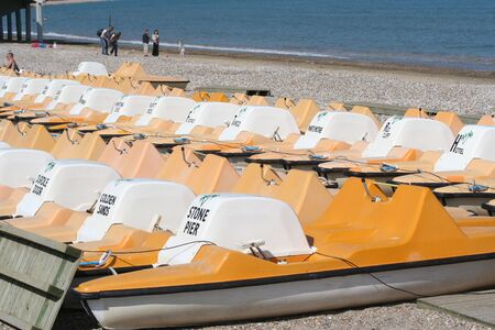 Pedalos on the beachの写真素材