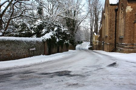 Borough street in Godalming, Surrey, England in the snow.の写真素材